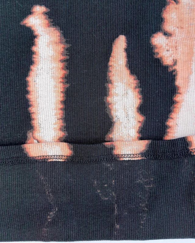 The pattern on this @nextofficial rib jersey top, is achieved by discharge printing. This print technique is used when a good hand feel is required and the base colour is darker than the print colours. It can only be done on cellulose bases. #jersey #jerseyfabric #mytrainedeyejersey