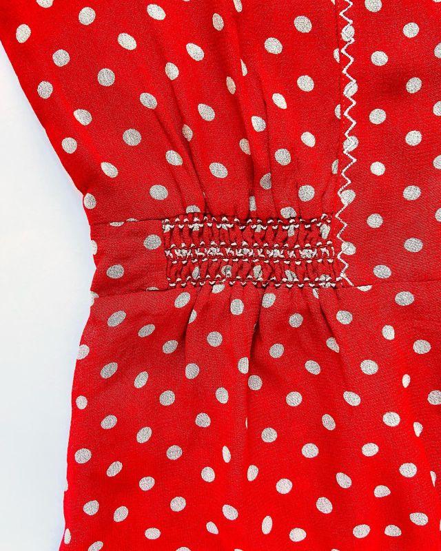 Here, a mix of machine and hand embroidery can be seen, over a smocked insert. #wovens #mytrainedeyewovens