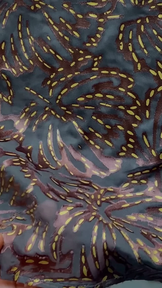 This @frenchconnection shirt has a composition of viscose and nylon. After printing the viscose velvet pile, areas are then burnt away, leaving a sheer nylon base.