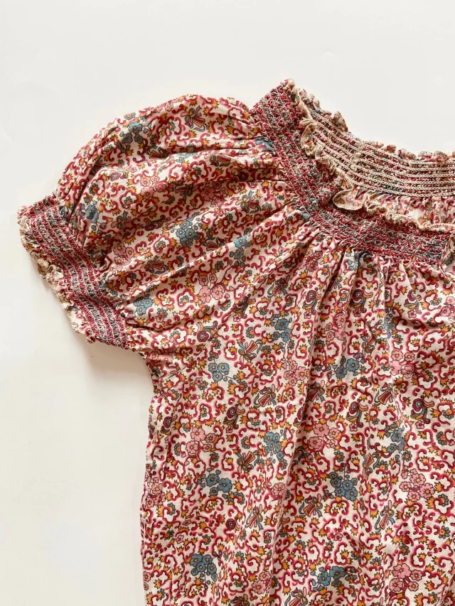 This @newlook top has shirring around the neck line and cuff. This has been created with elastic on the underside to create the gathered, stretchy effect.
 As the machine sews, the elastic thread on the underside gathers the fabric automatically, creating even, stretchy pleats. 
 The embroidered design is applied over the shirred fabric using embroidery machines. The embroidery thread follows the natural gathered lines to enhance the smocking-like effect.  #mytrainedeye #productdevelopment #trainingcourse #newlook #smockedtop
#wovens